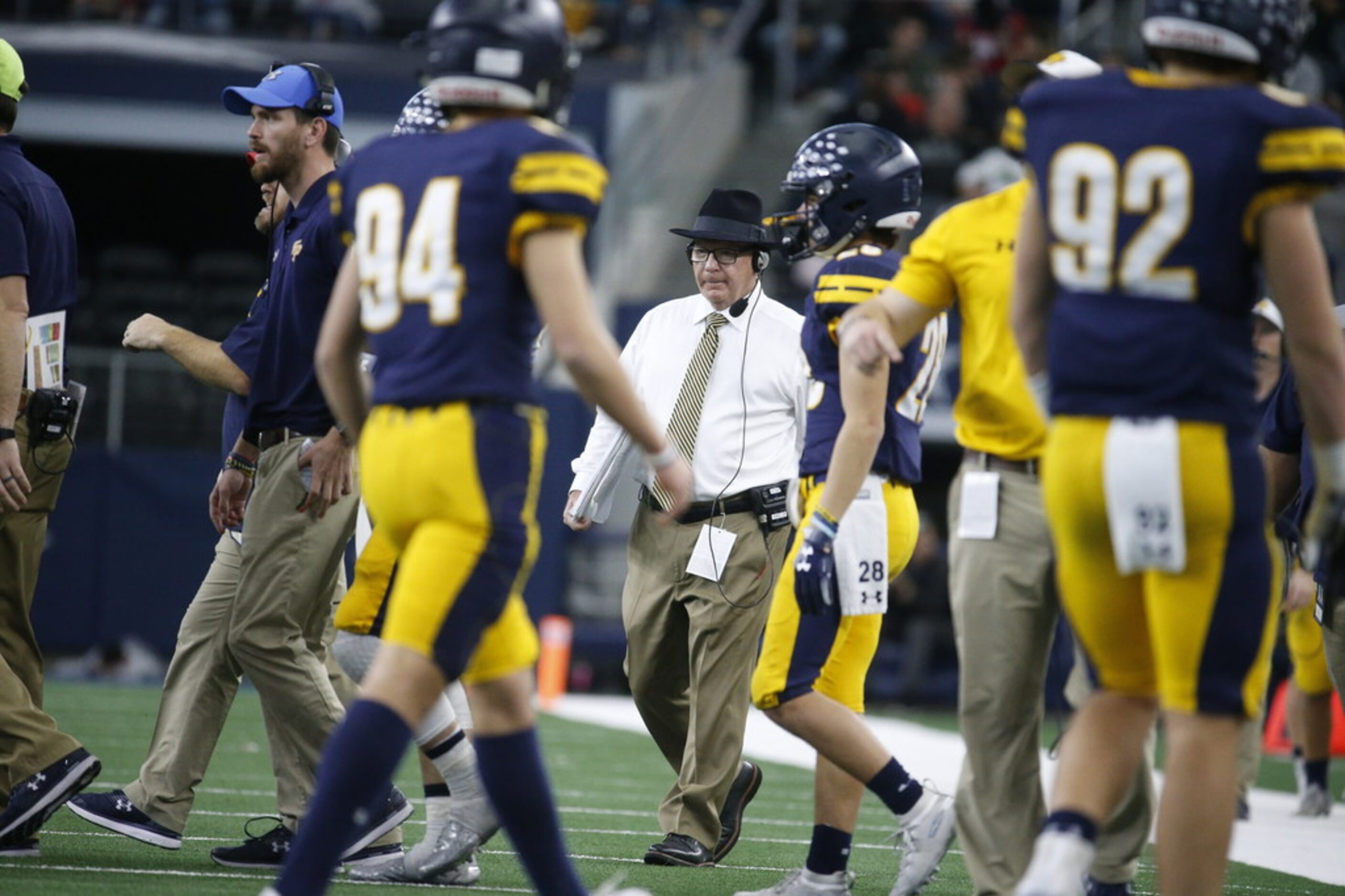 Highland Park's head coach Randy Allen walks onto the field during the second half of the...