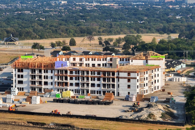 Aerial view of construction near the intersection of Windhaven Parkway and Spring Creek...