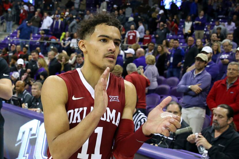 Oklahoma guard Trae Young (11) celebrates after the 90-89 win over TCU in an NCAA college...