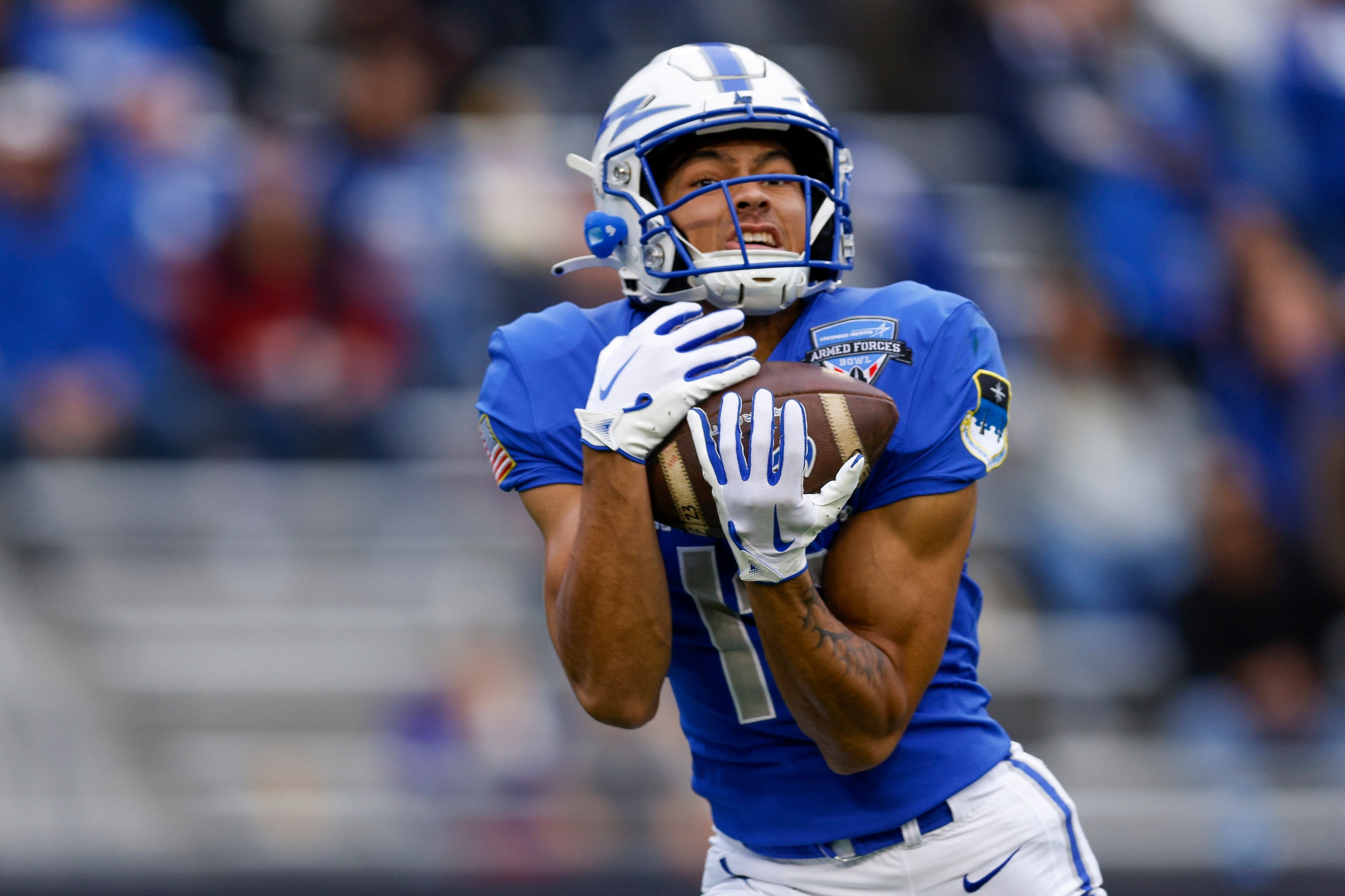 Air Force Falcons wide receiver Jared Roznos (13) catches a pass for a 42-yard touchdown...