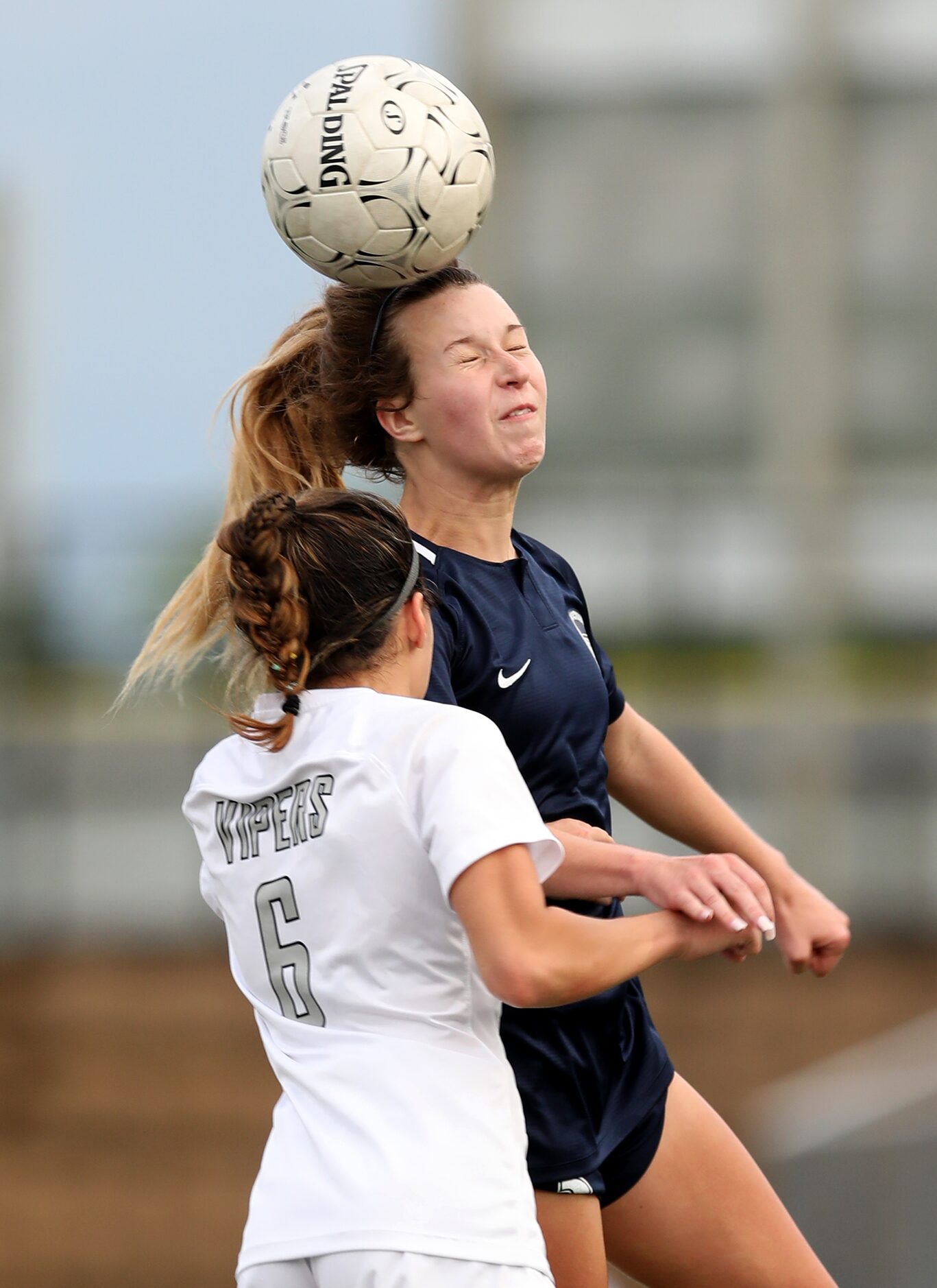 Lewisville Flower Mound's Tatum Beck (3) and Austin Vandegrift's Hailey Sapinoro (6) during...