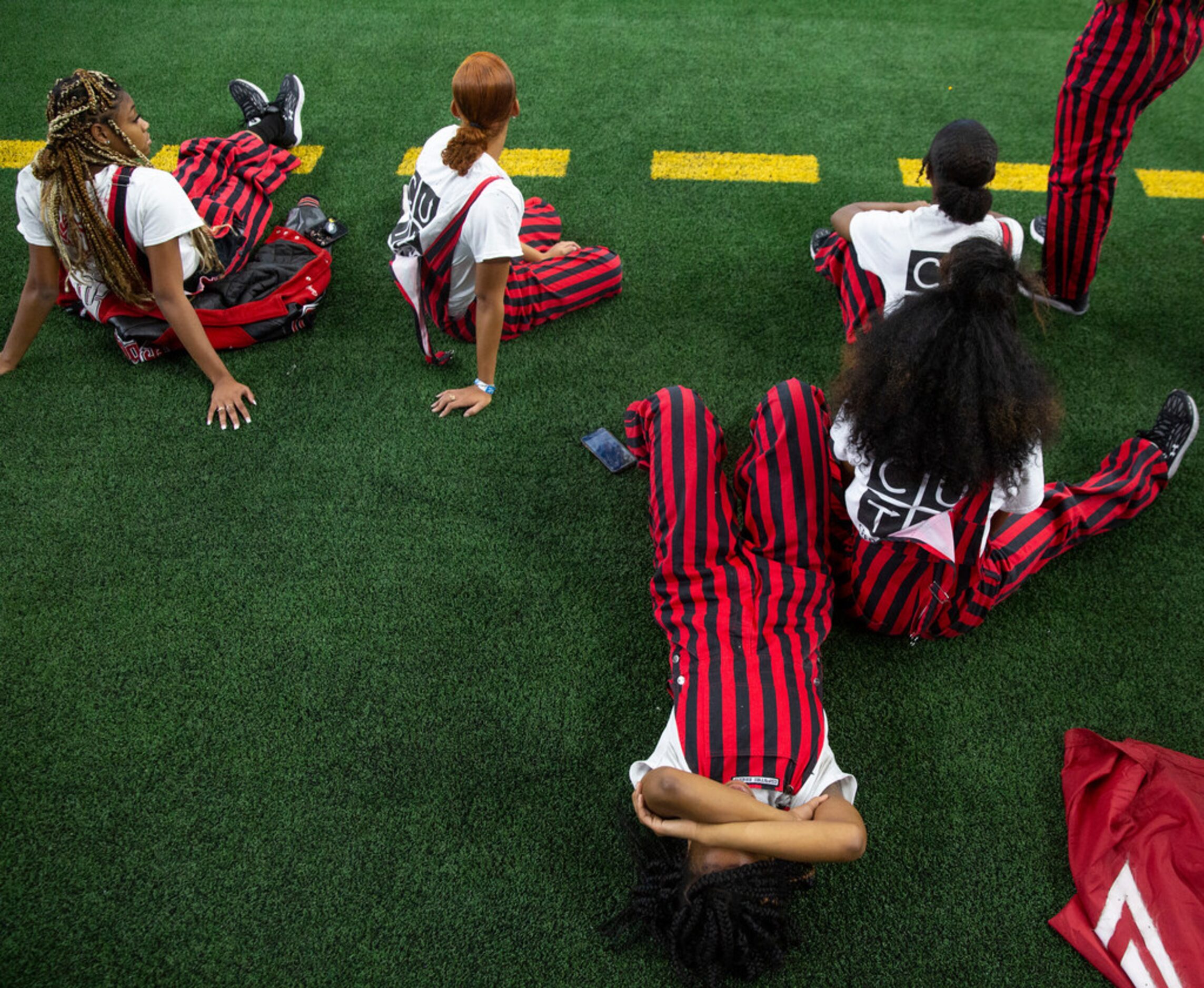 Cedar Hill flag runners react to another fumble recovery by Denton Guyer in the final...