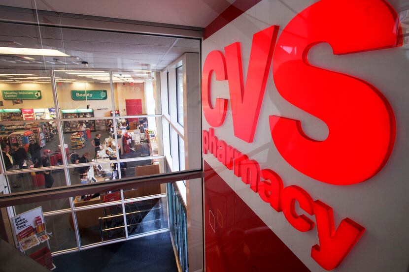 FILE - In this Nov. 3, 2009 file photo, a CVS pharmacy sign is displayed at a CVS in...