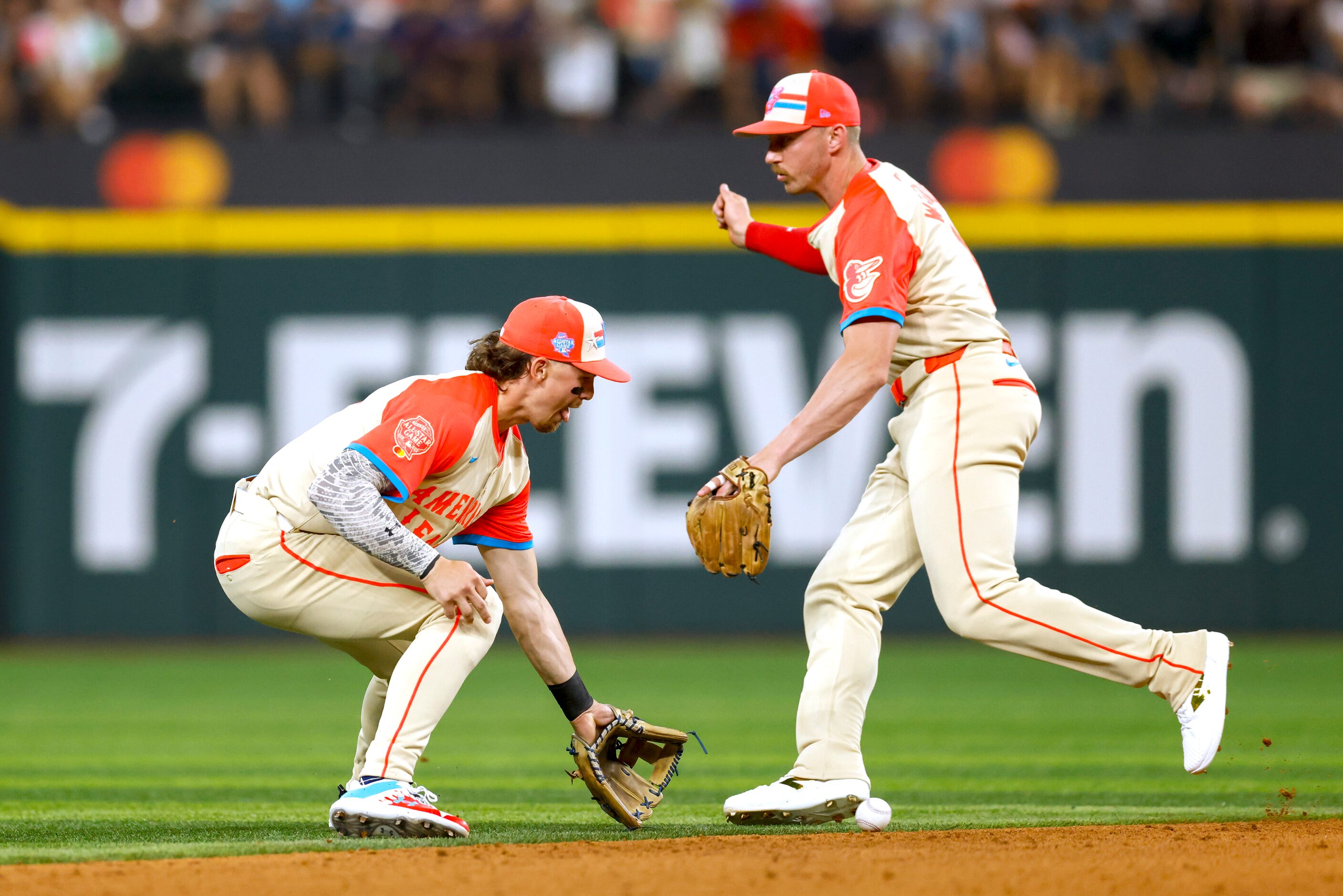 American League's Bobby Witt Jr., of the Kansas City Royals, fields a ball as American...