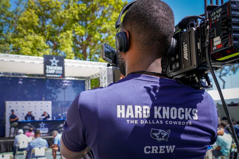 A HBO Hard Knocks crew records the opening news conference for the Dallas Cowboys training...