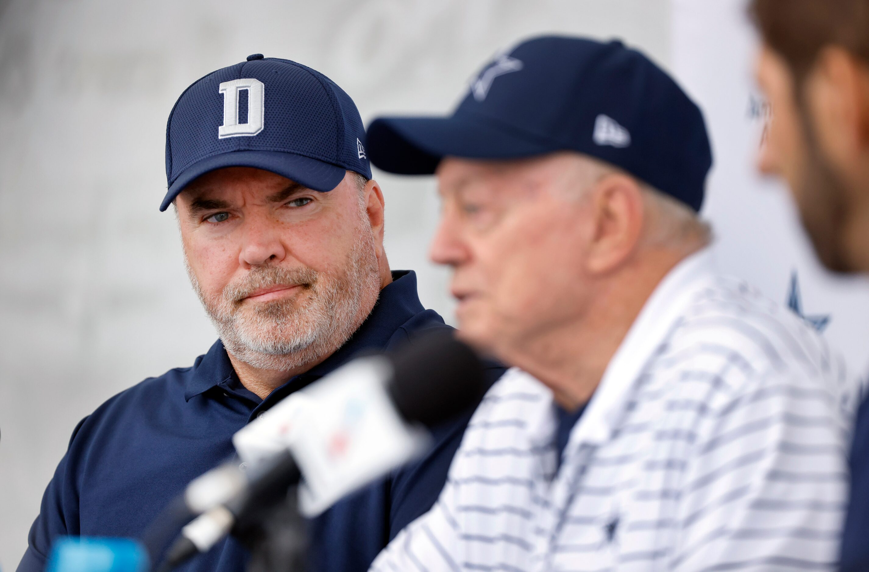 Dallas Cowboys head coach Mike McCarthy (left) listens to owner Jerry Jones speak during the...