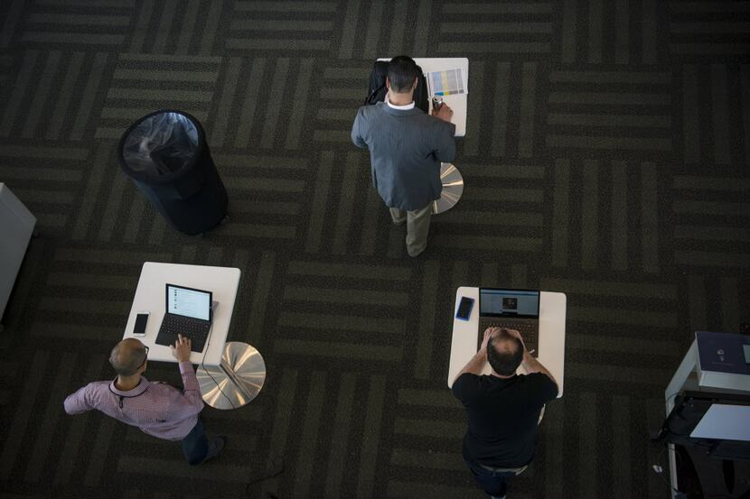 Attendees work on laptop computers at the Microsoft Developers Build Conference in San...