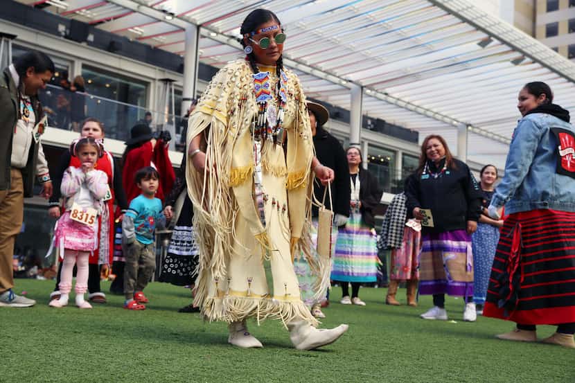 Fashion show grand prize winner Juliane Rives, who is Kiowa and Comanche, wore a traditional...