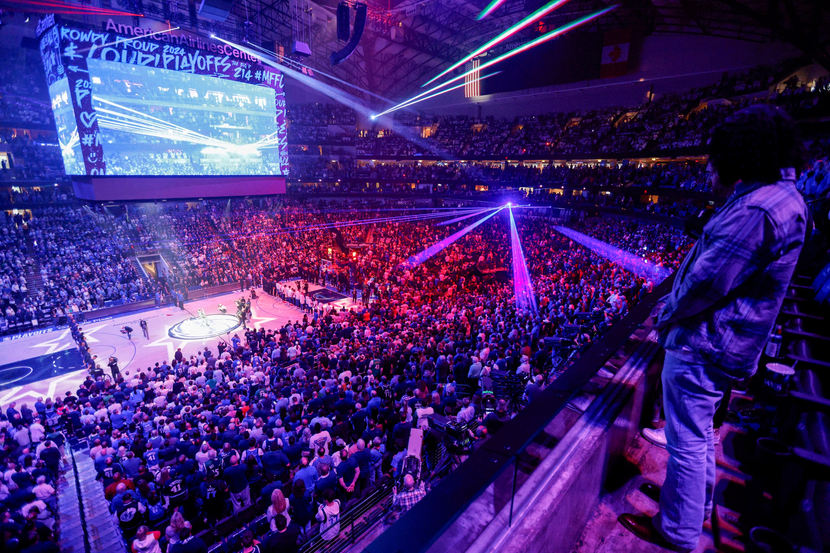 Fans stand for the national anthem before Game 3 of an NBA basketball first-round playoff...