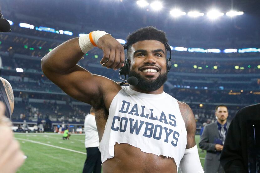 Dallas Cowboys running back Ezekiel Elliott (21) does his signature "Feed Me" routine as he...