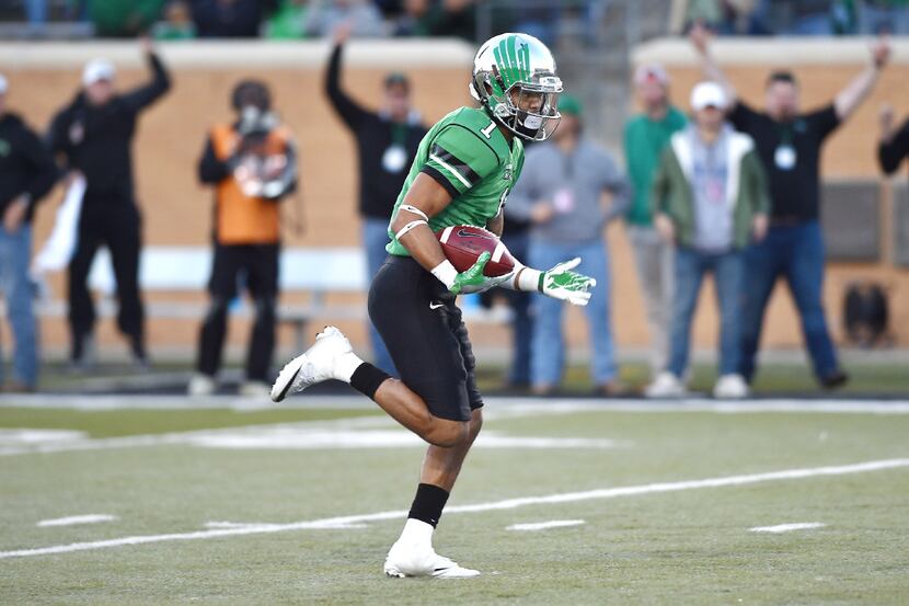 North Texas junior wide receiver Turner Smiley (1) makes a run for a touchdown. The Southern...