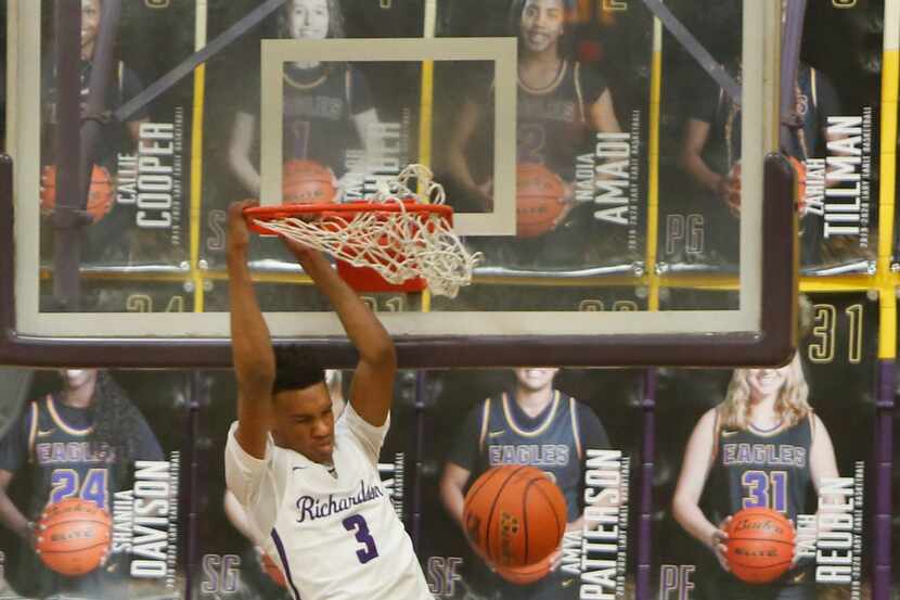 Richardson's Rylan Griffin (3) dunks during first half action against Duncanville. The two...