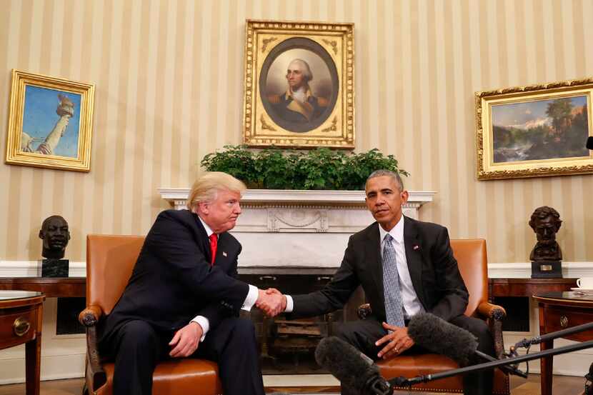 President Barack Obama and President-elect Donald Trump shake hands following their meeting...