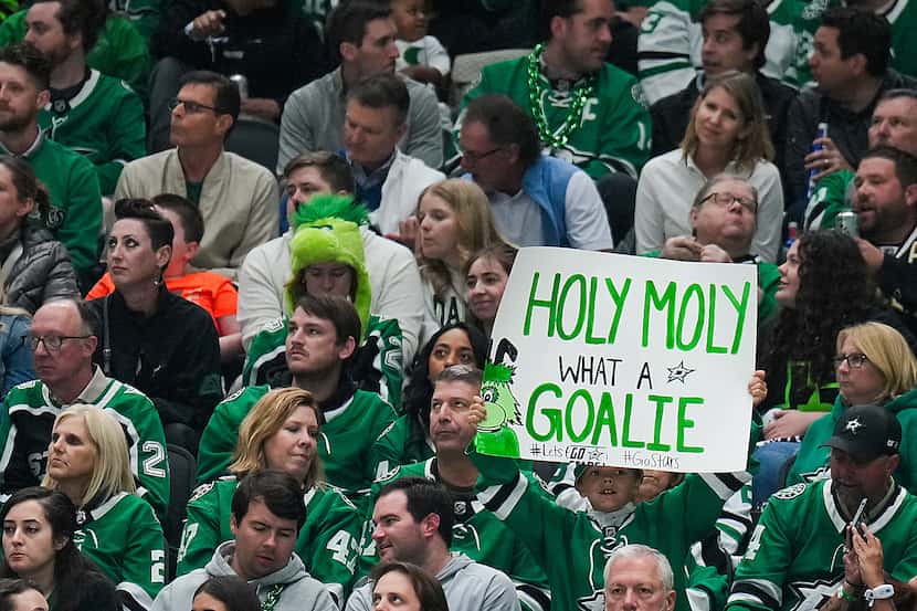 Fans cheer Dallas Stars goaltender Jake Oettinger during the second period in Game 2 of an...