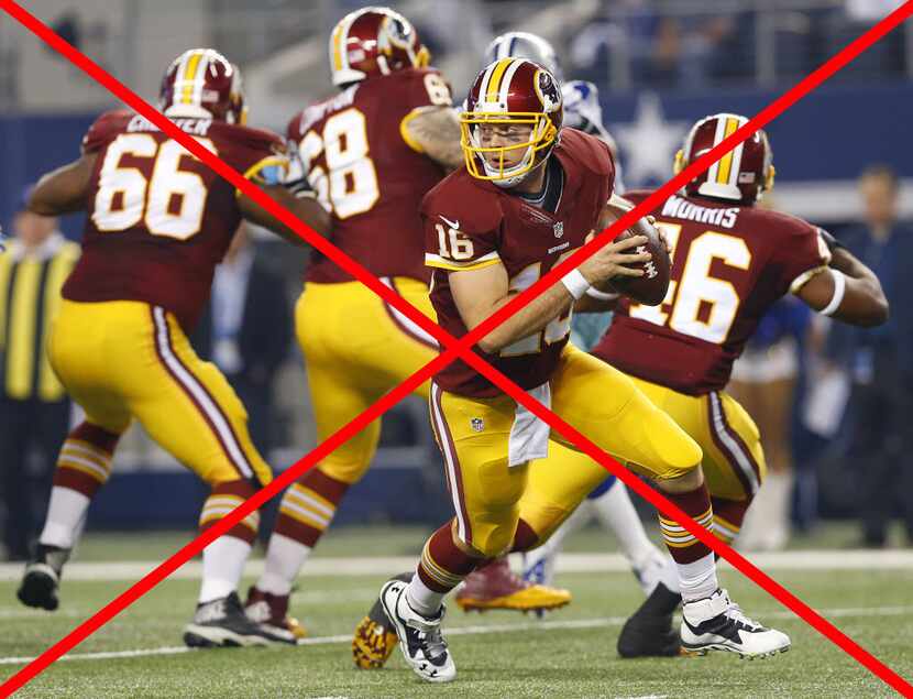 Washington Redskins quarterback Colt McCoy (16) fakes the hand off and rolls out against the...