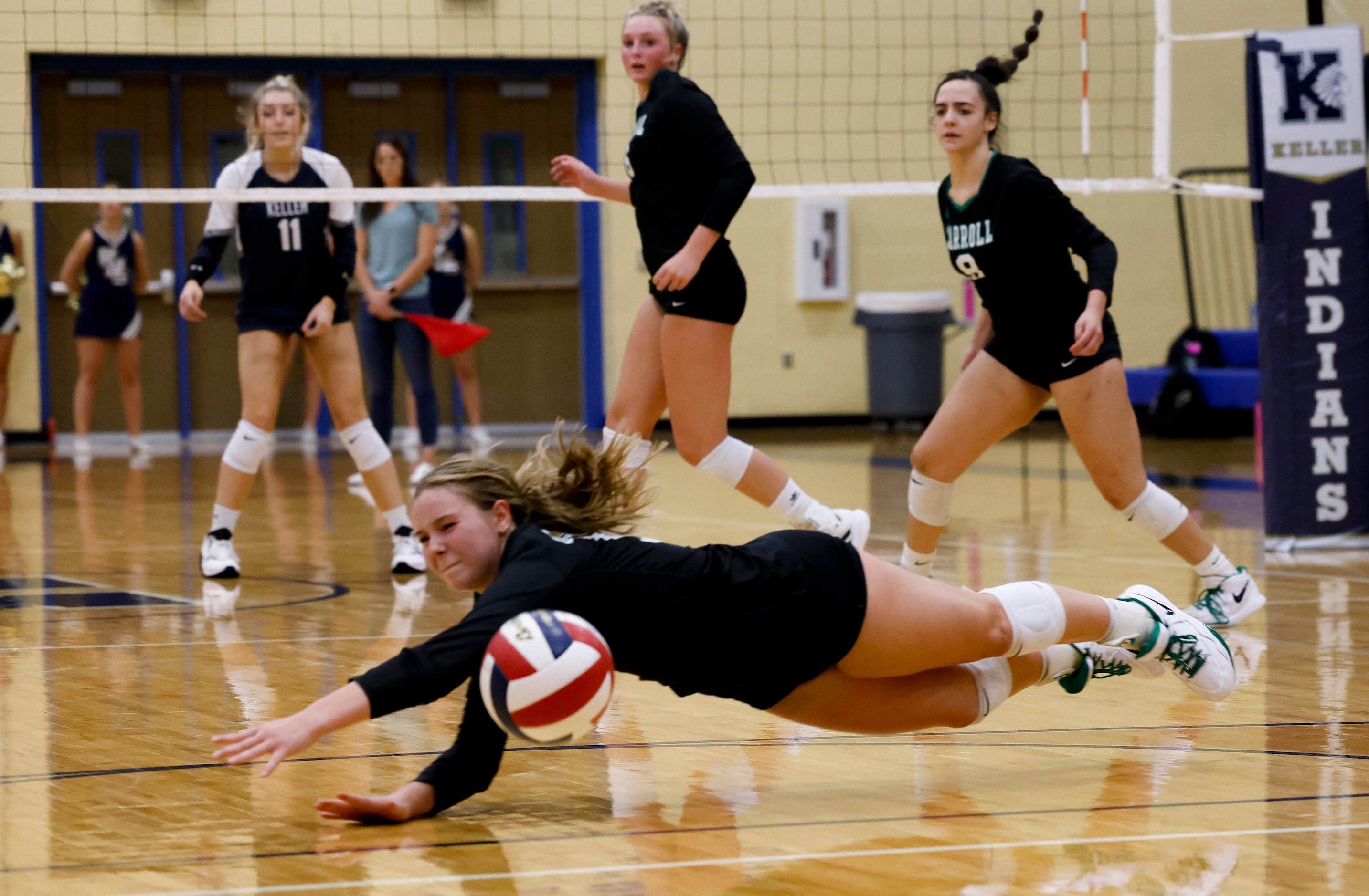 Southlake Carroll’s Taryn Barnes (9) fails to return the ball against Keller during the...