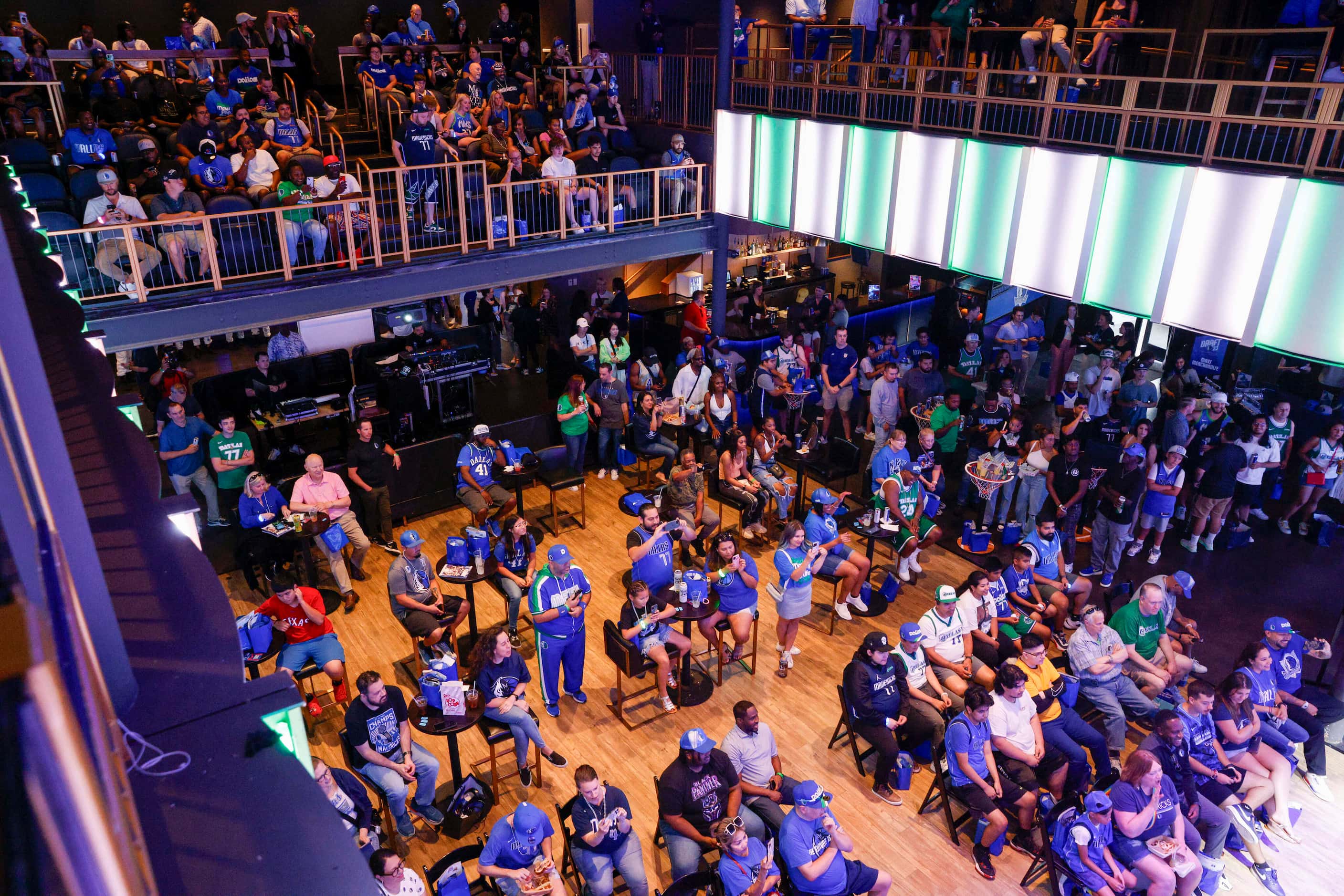 Dallas Mavericks fans watch coverage of the 2023 NBA Draft during a watch party at The Echo...