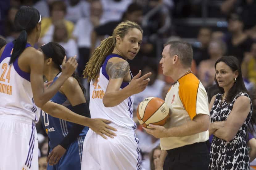 Phoenix Mercury's Brittney Griner (42) reacts to picking up her fourth foul against the...