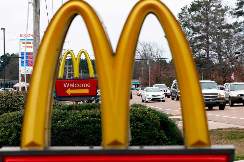 Seven national fast-food chains, including McDonald's, have agreed to end policies that...