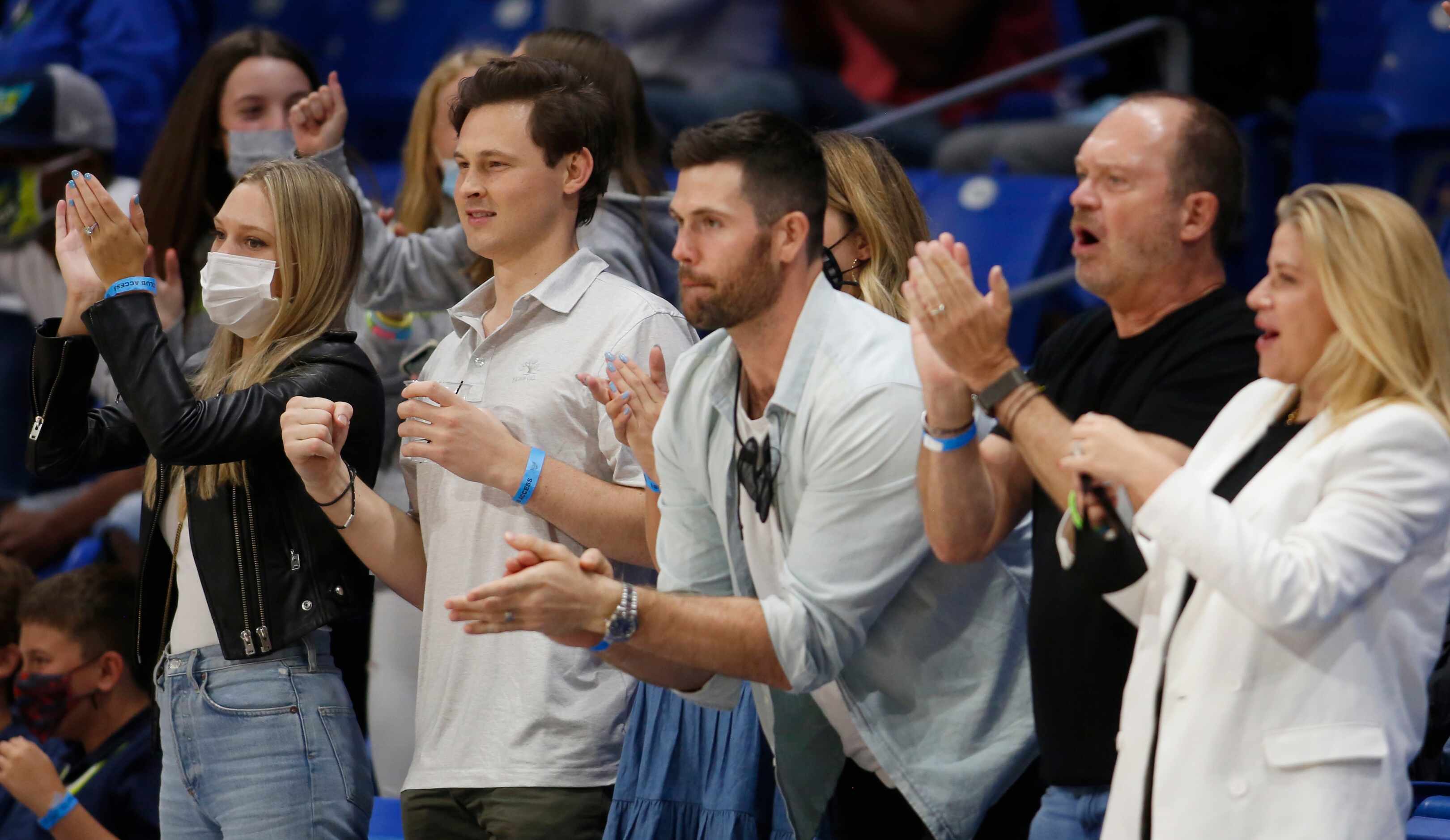 Dallas Wings fans react to a play during the 4th quarter of their game against Seattle. The...