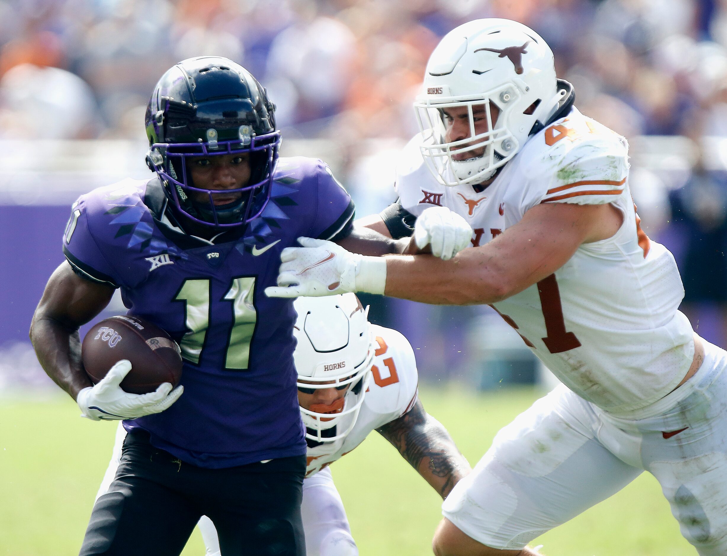 TCU Horned Frogs wide receiver Derius Davis (11) tries to get in the end zone past Texas...