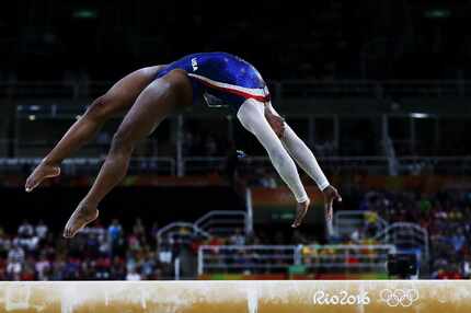 Simone Biles of the United States competes on the balance beam during the Women's Individual...