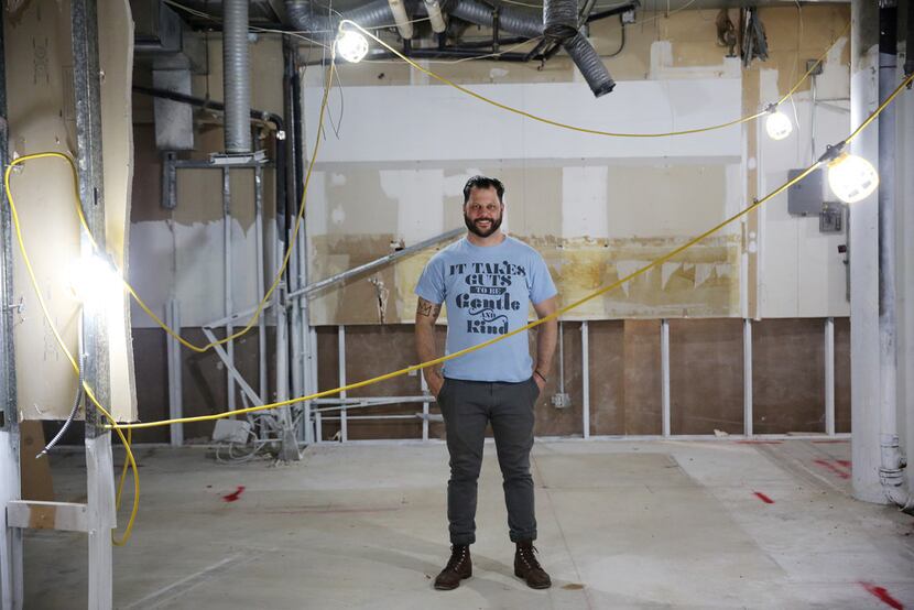 Chef Chad Houser, founder of Cafe Momentum, stands in the space of a planned community...