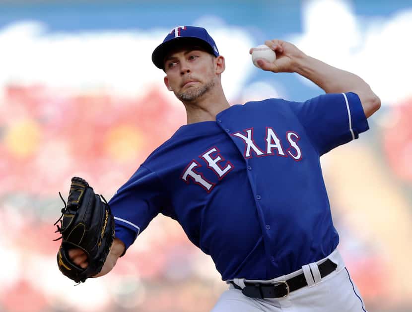 Texas Rangers starting pitcher Mike Minor (23) pitches in the first inning of play in a game...