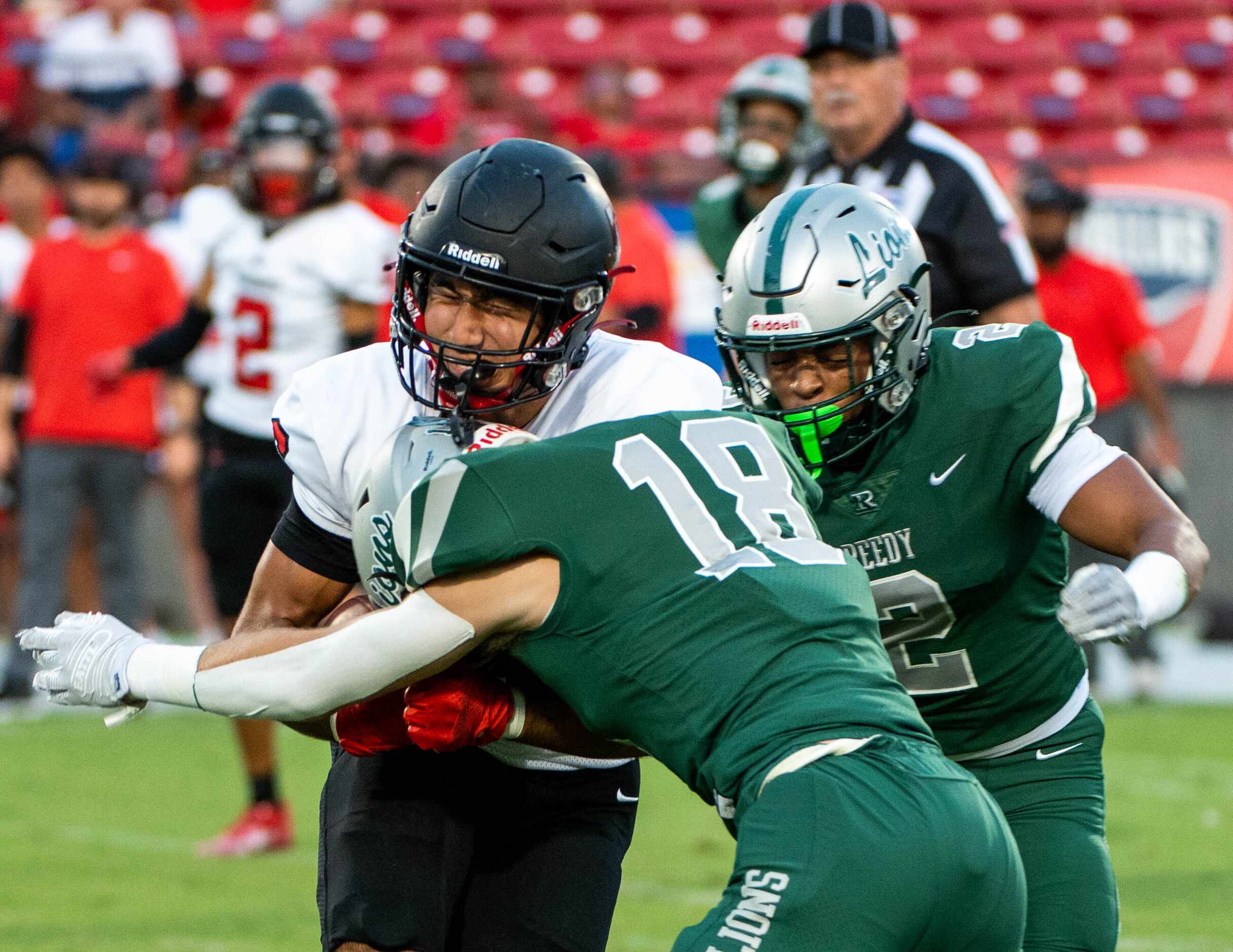 Frisco Liberty's Diego Jurado (6) reacts to taking a hot from Frisco Reedy's Cole Powell in...