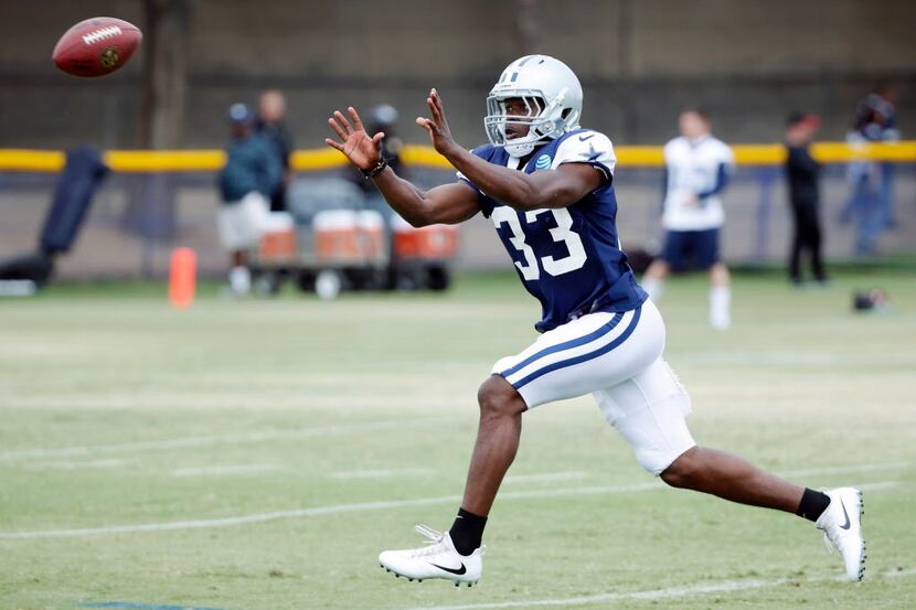 Dallas Cowboys cornerback Chidobe Awuzie (33) prepares to catch the ball in a drill during...