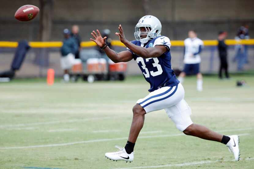 Dallas Cowboys cornerback Chidobe Awuzie (33) prepares to catch the ball in a drill during...