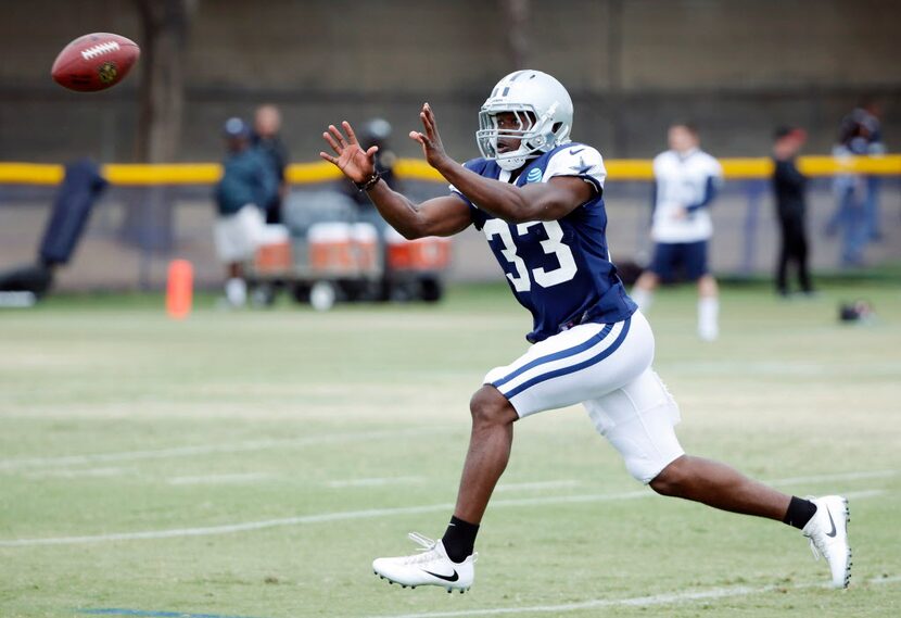 Dallas Cowboys cornerback Chidobe Awuzie (33) prepares to catch the ball in a drill during...