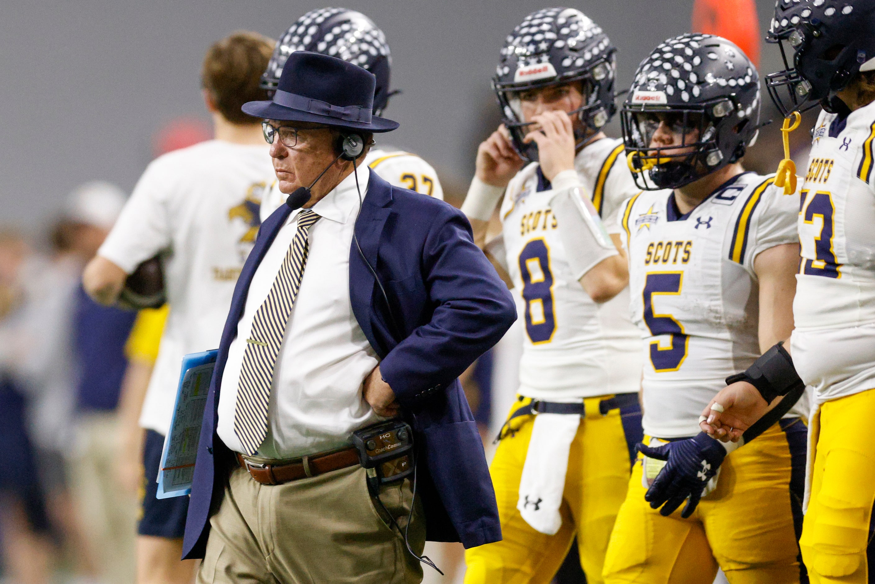 Highland Park head coach Randy Allen walks onto the field during a timeout during the first...