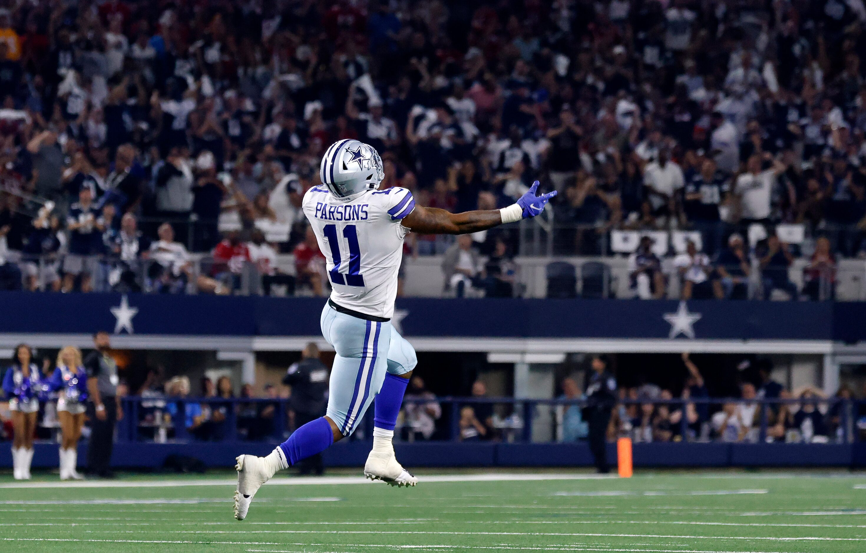 Dallas Cowboys linebacker Micah Parsons (11) celebrates after sacking Tampa Bay Buccaneers...