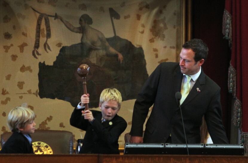 Ten-year-old Aidan Isaac wielded the gavel for his dad, state Rep. Jason Isaac, R-Dripping...