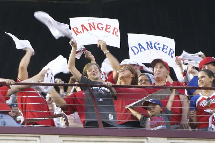 Rangers fans get amped before Game 3 of the ALDS between the Texas Rangers and the Toronto...