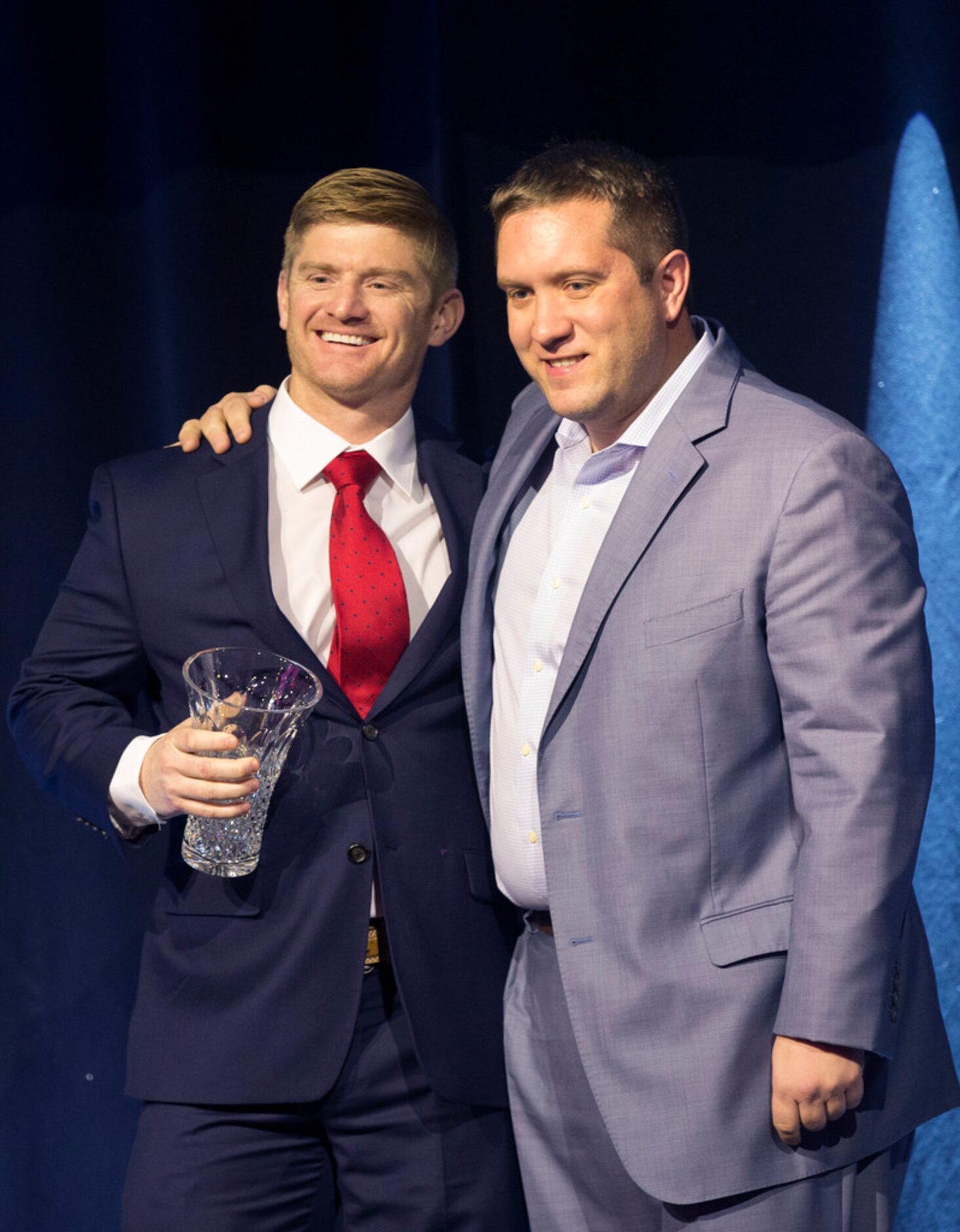 Sean Fields, 2018 Bobby Jones Player Development Man of the Year winner, left, poses for...