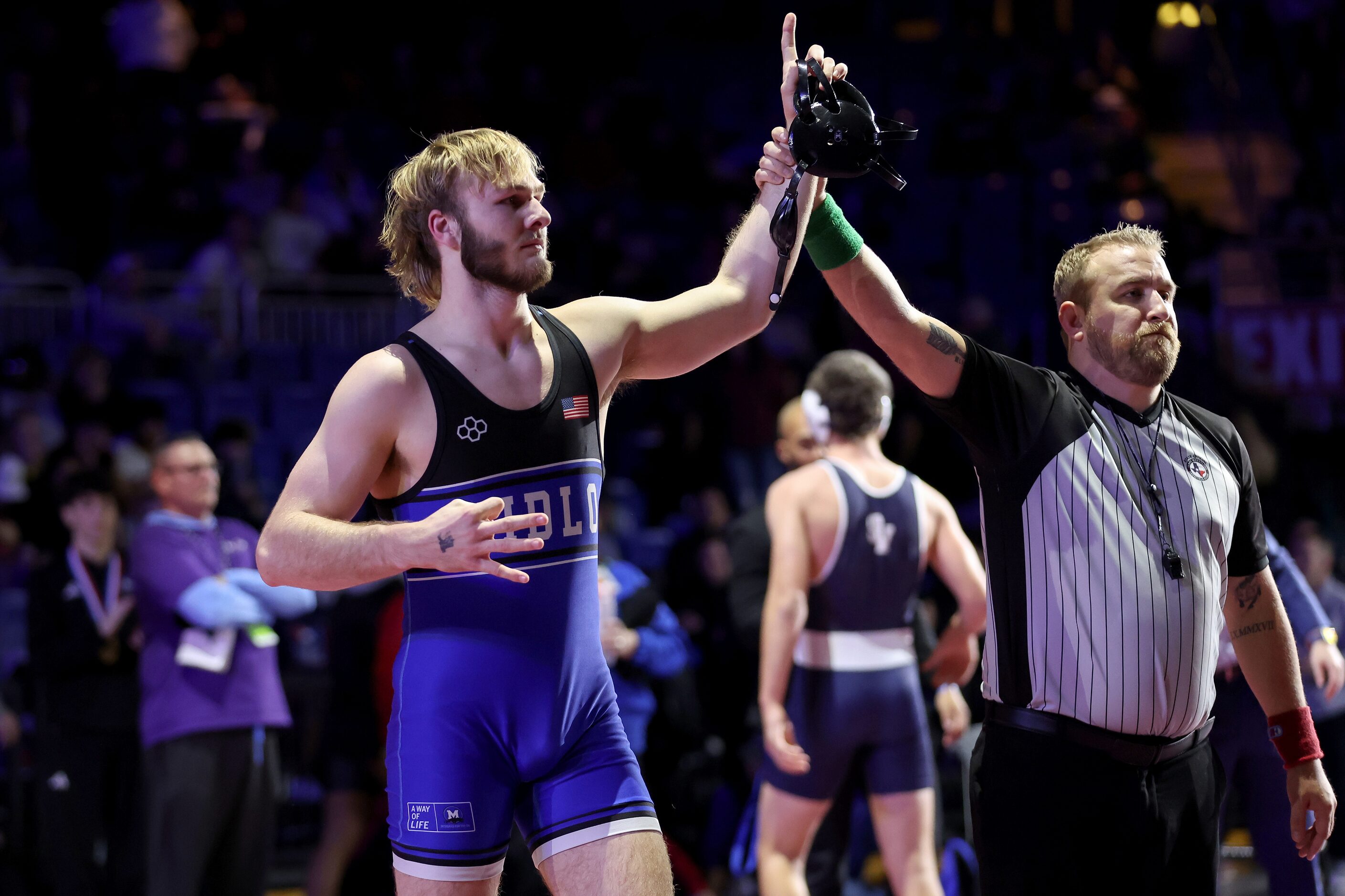 Karson Tompkins of Midlothian celebrates after defeating Nicholas Dudzikowski of Comal...