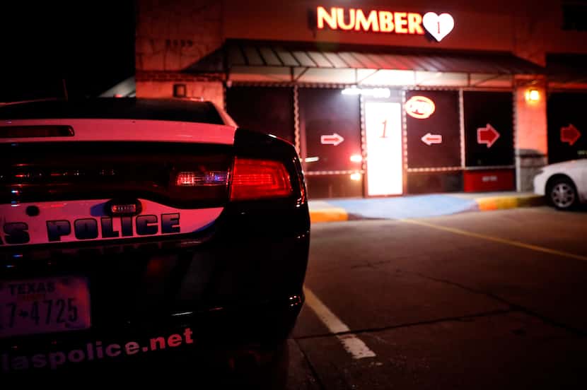 The Dallas Police vice unit raided a massage parlor named Number 1 on Walnut Hill Lane in...