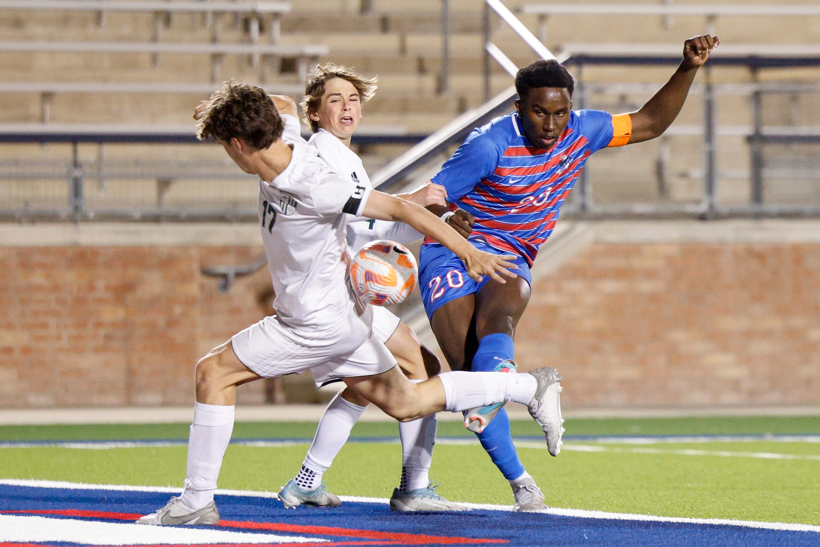 Prosper’s Tate Jones (17) blocks a shot attempt from Allen’s Osimirah Iyamah (20) during the...