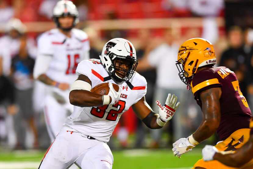 LUBBOCK, TX - SEPTEMBER 16: Desmond Nisby #32 of the Texas Tech Red Raiders looks for...