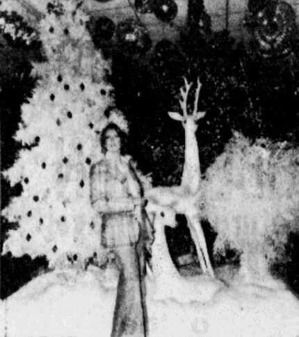 Annette Grubich, decorator and display designer of The Original Christmas Store. Published...