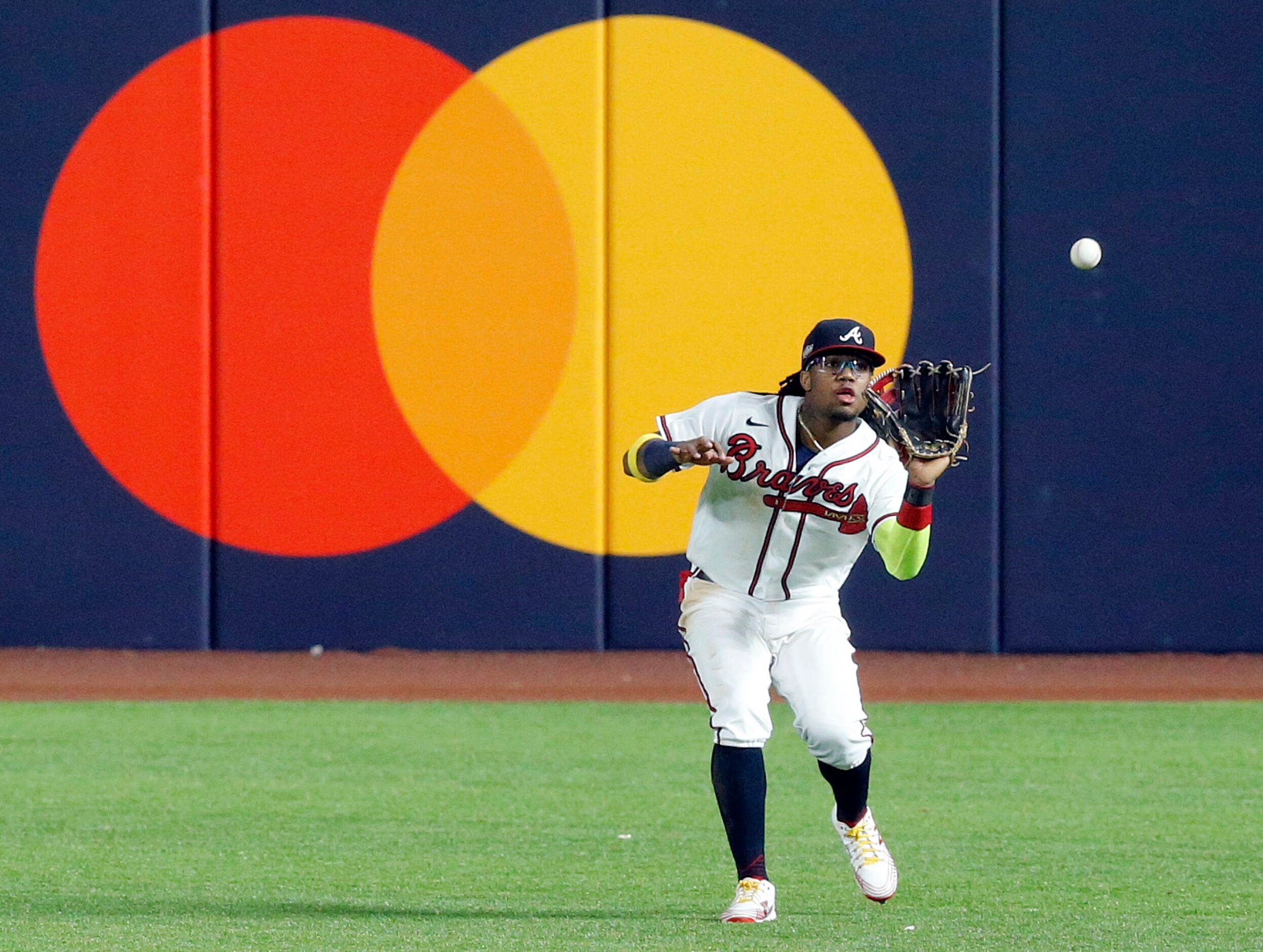 Atlanta Braves right fielder Ronald Acuna Jr. (13) catches a fly ball hit by Los Angeles...