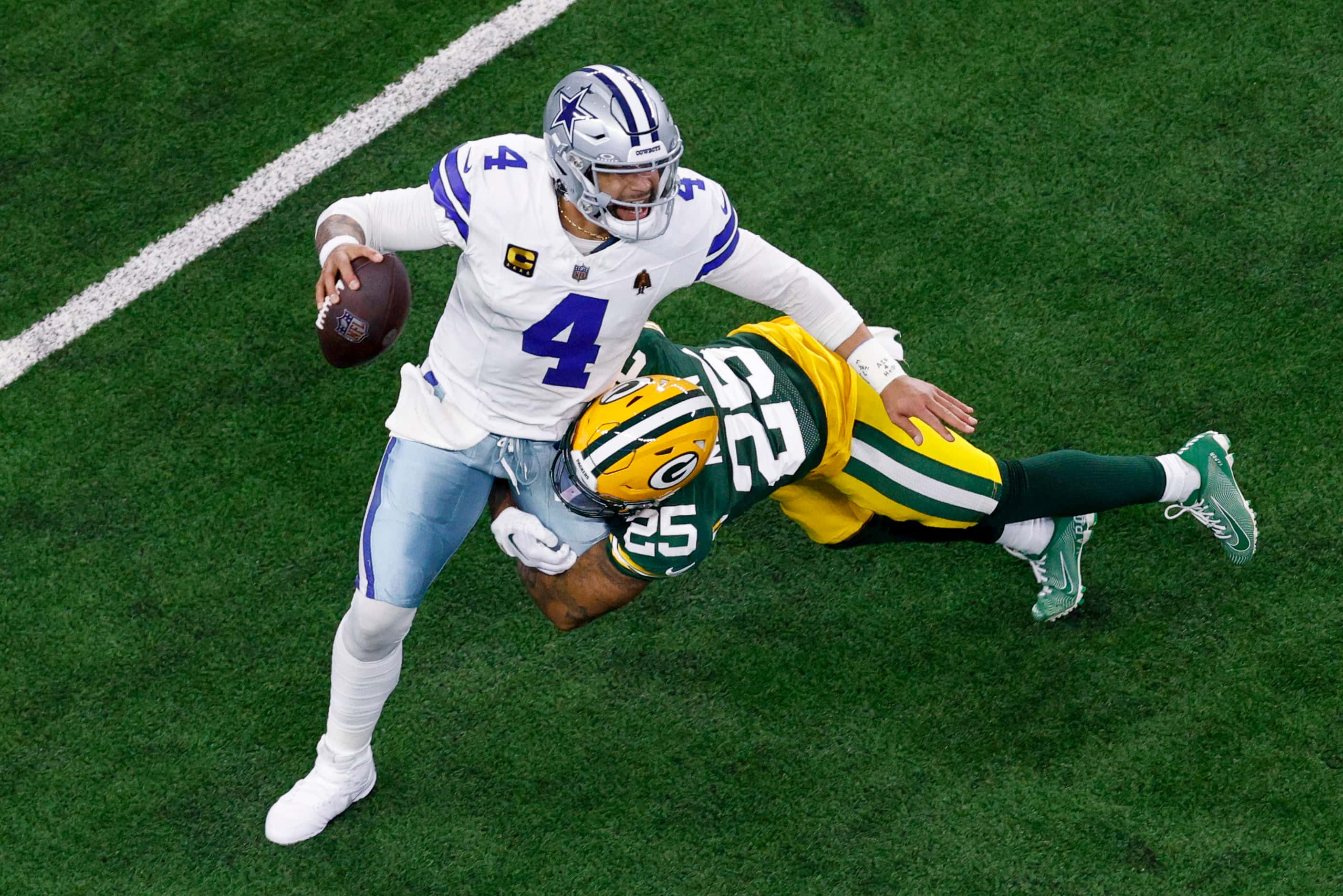 Green Bay Packers cornerback Keisean Nixon (25) sacks Dallas Cowboys quarterback Dak...