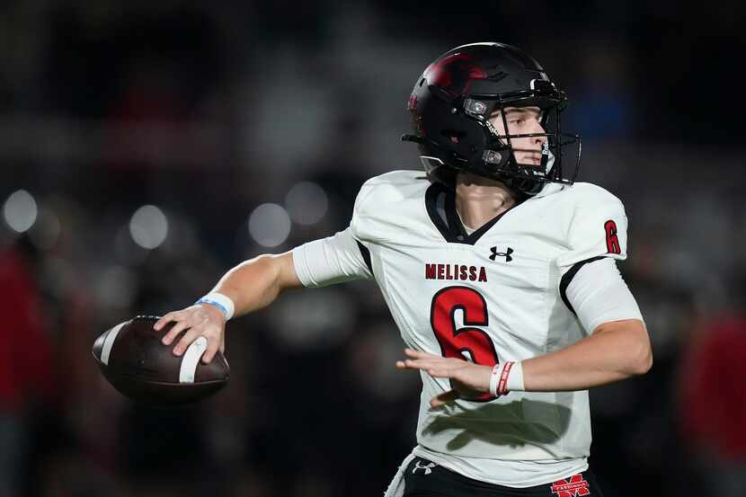 Melissa quarterback Trever Ham (6) throws a pass during the second half of a District 7-5A...