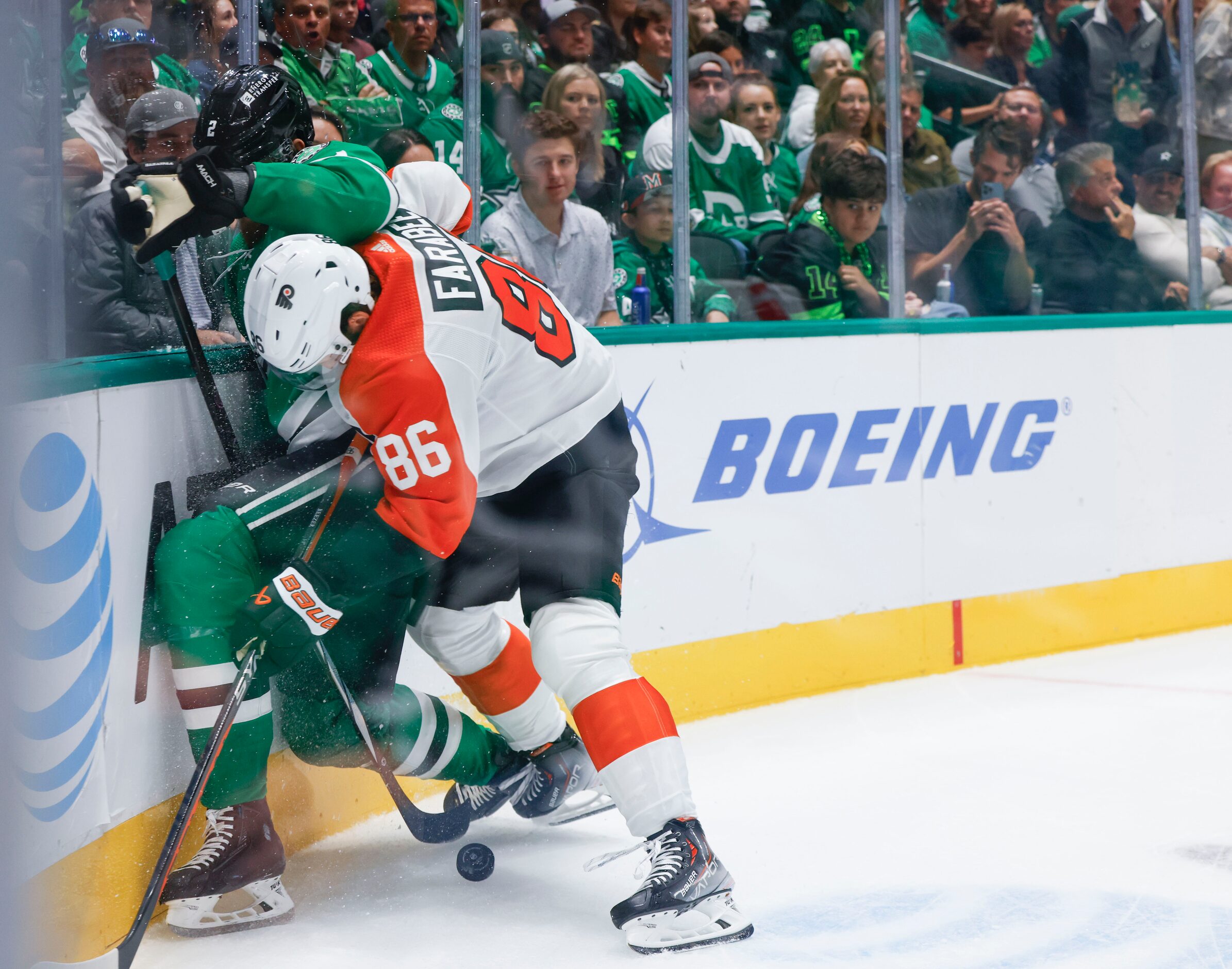 Dallas Stars defenseman Jani Hakanpaa (left) and Philadelphia Flyers left wing Joel Farabee...