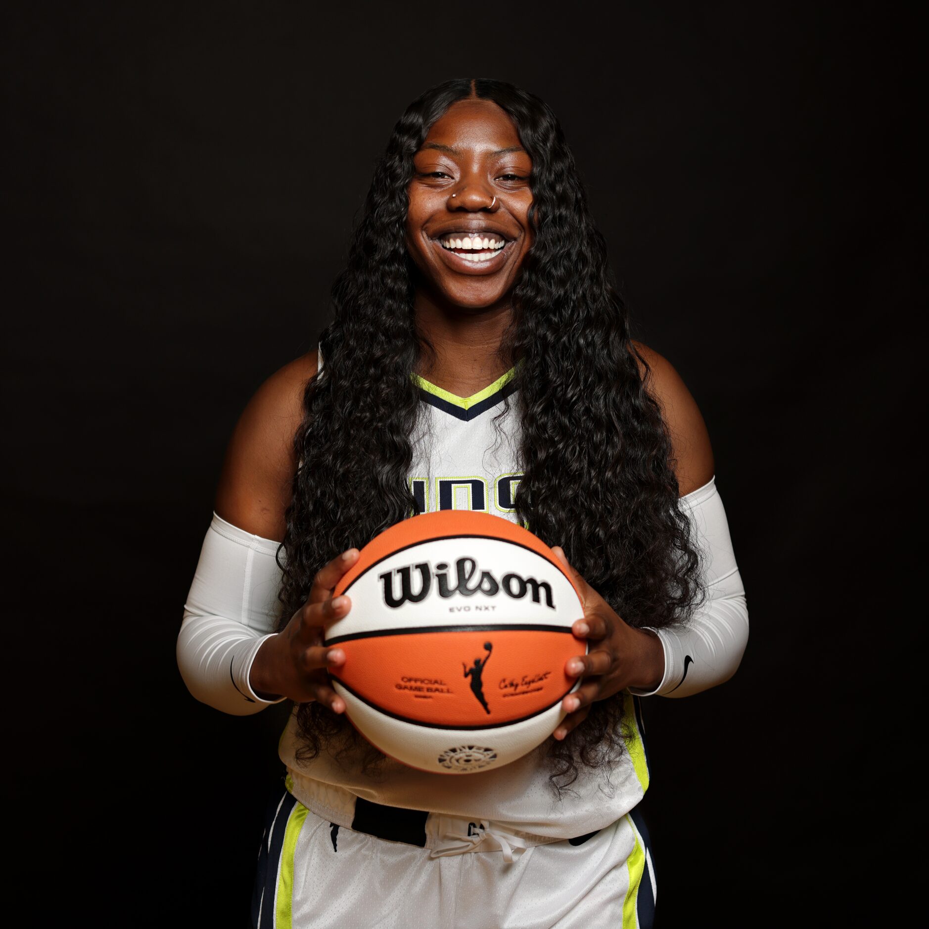 #24 Arike Ogunbowale with The Dallas Wings poses for a photograph at College Park Center in...