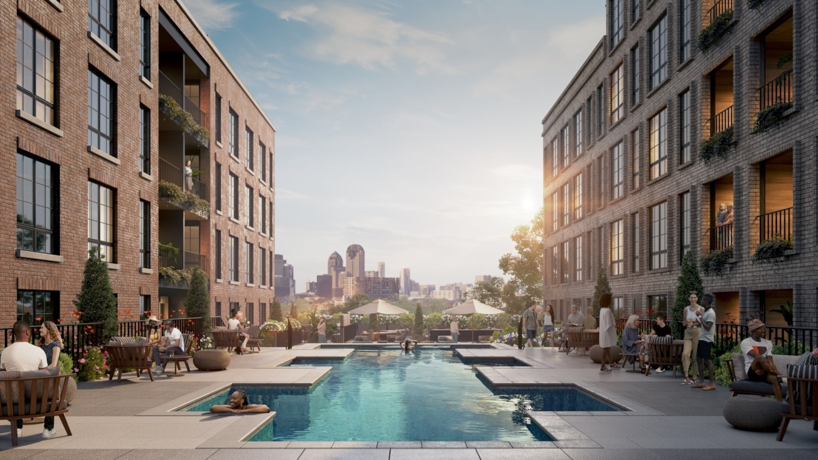 The pool and amenity deck at The Juniper overlooks the Dallas city skyline.