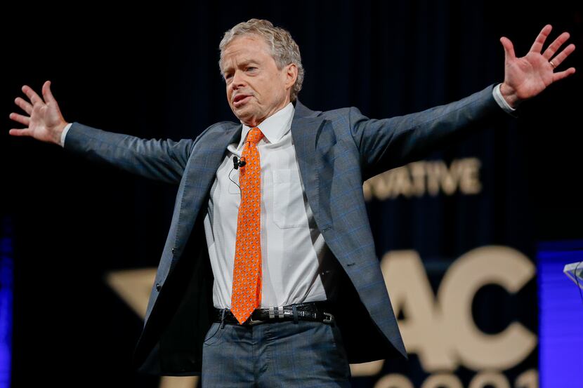 Former Texas state Sen. Don Huffines waves to the crowd after speaking at the Conservative...