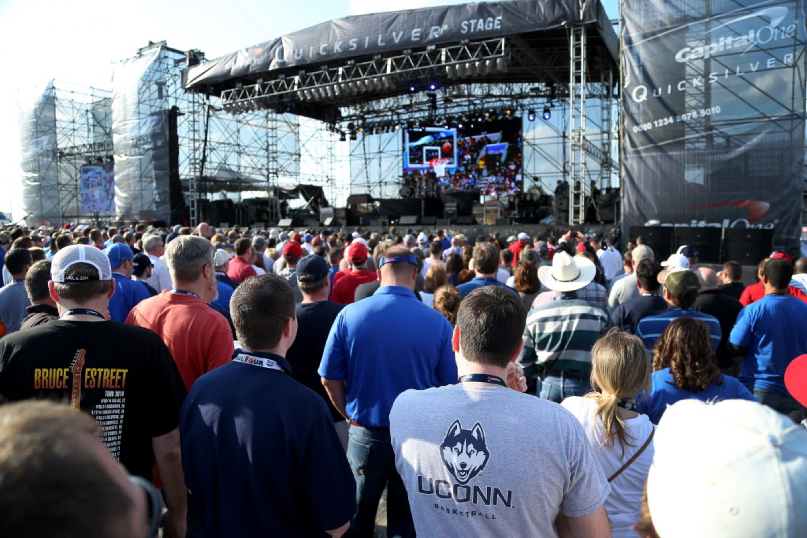 Fans gather at the main stage in the Tip-Off Tailgate presented by Infiniti area on the east...